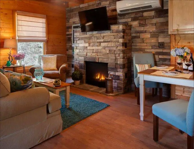 Step Away from Stress and Enjoy Life in a Secluded Log Home with Wraparound Porch