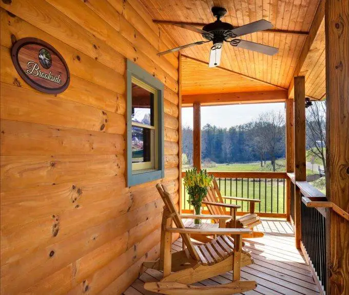 Step Away from Stress and Enjoy Life in a Secluded Log Home with Wraparound Porch