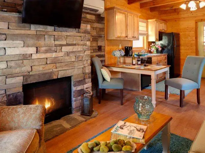 Step Away from Stress and Enjoy Life in a Secluded Log Home with Wraparound Porch