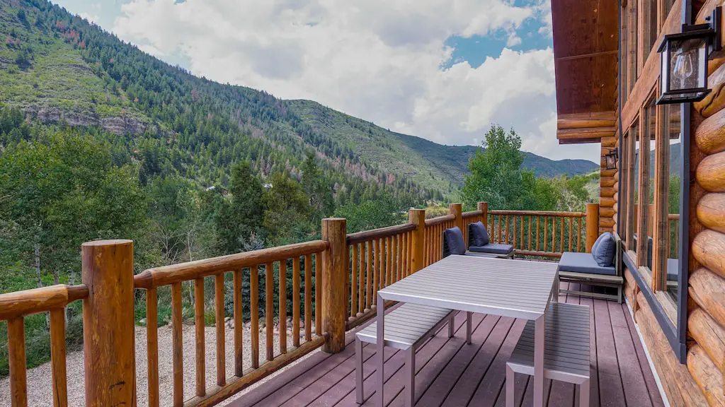 Wrap around porch with view of the mountains and canyon