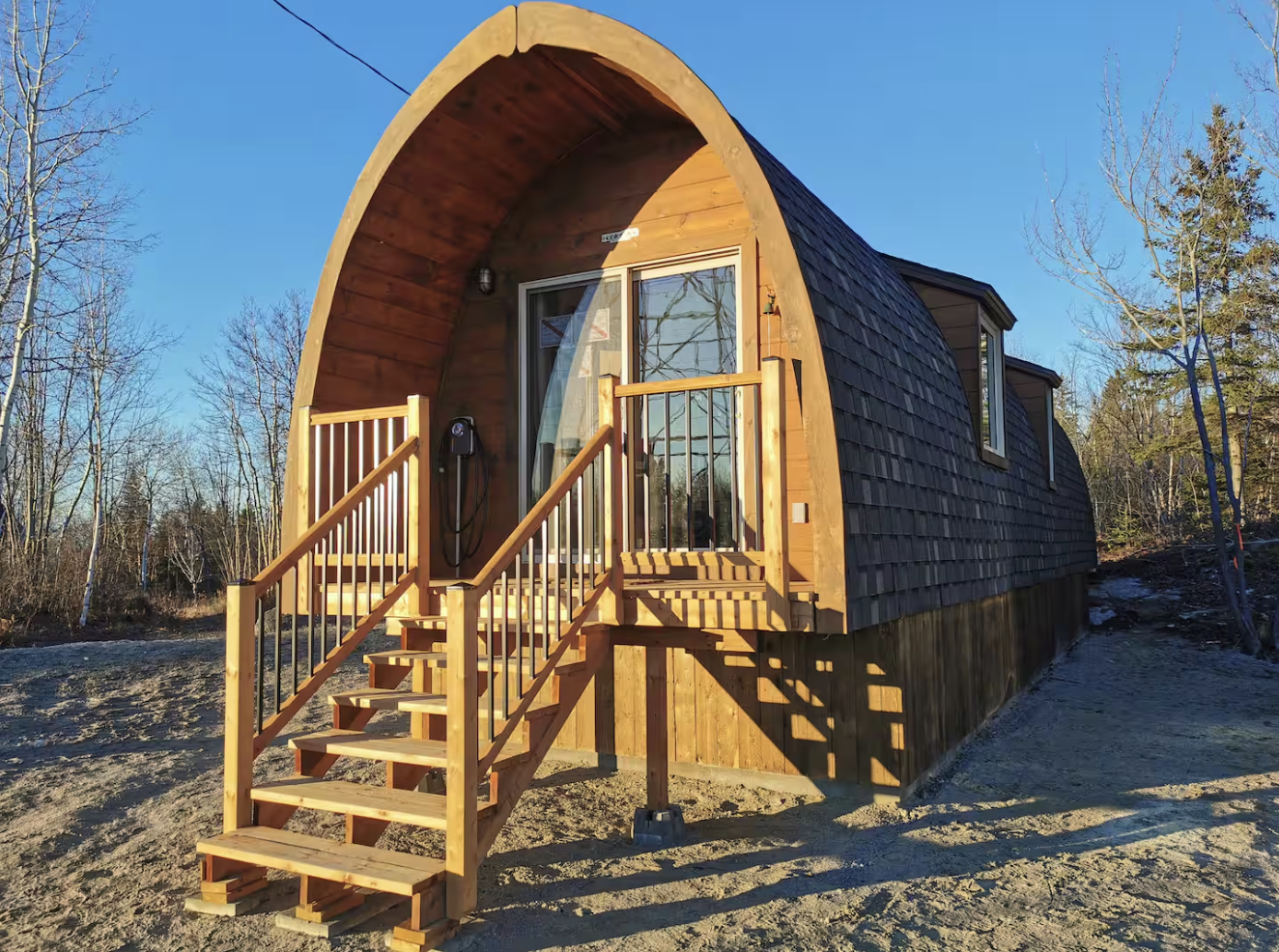 This Mini House Blends Warm Rustic Style With a Cozy Interior