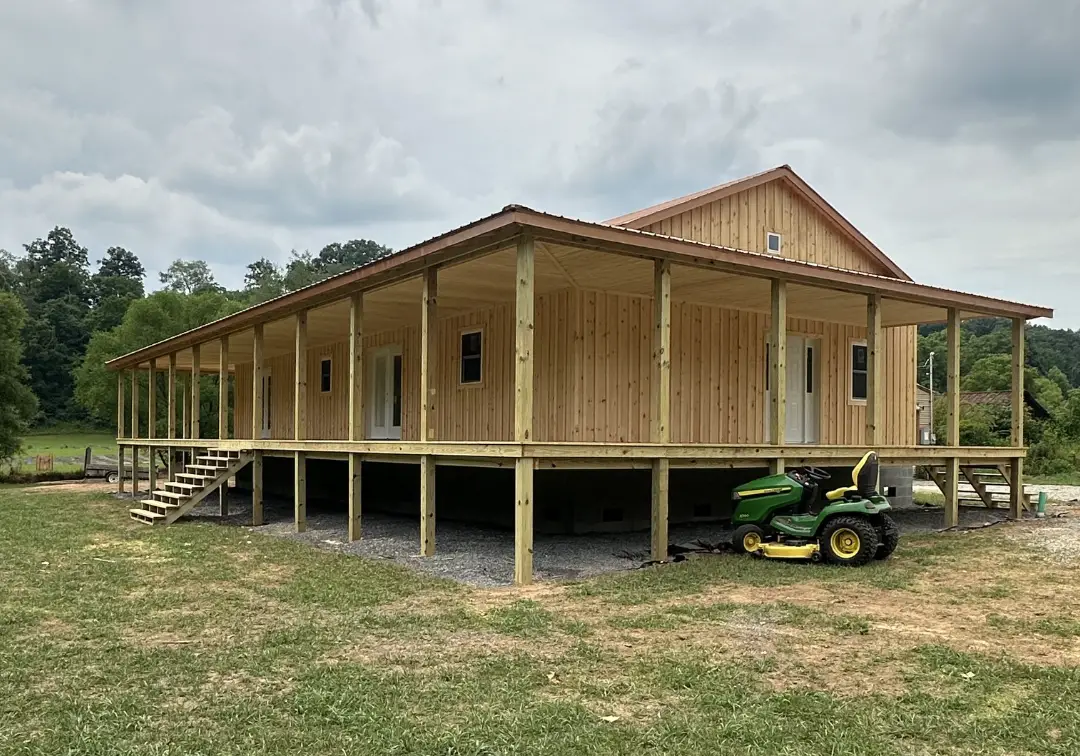  Amish Cabin with 3-Sided Wraparound Porches at $91,995