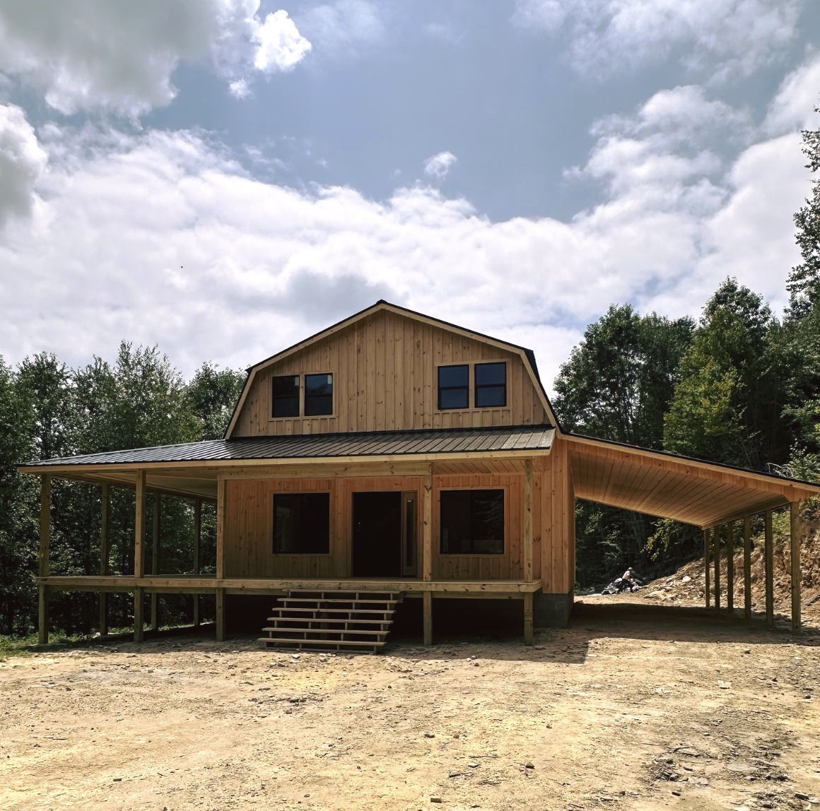28×40 Amish-Built Gambrel Cabin with Expansive 3-Sided Wraparound Porches