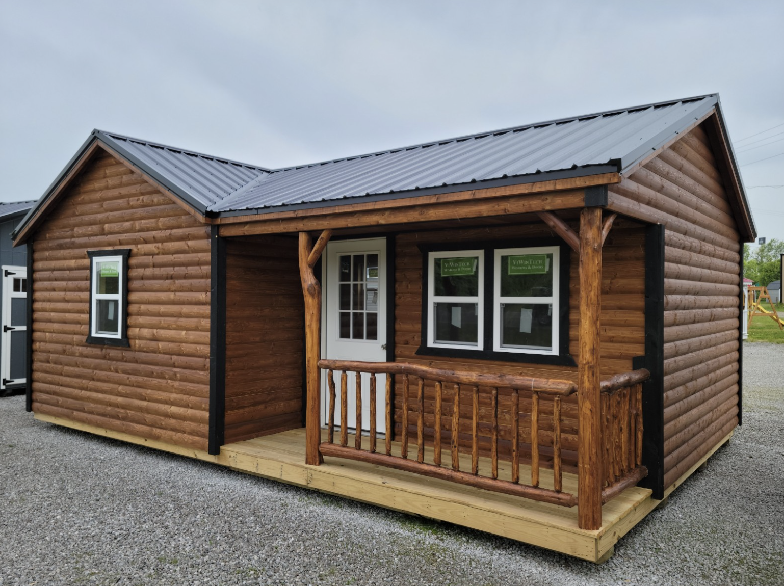 Discover a Rustic Cabin Model with a Beautiful Covered Porch