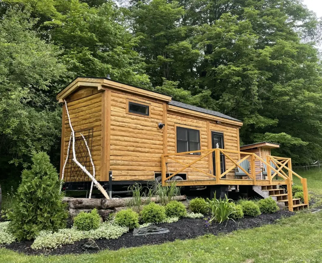 Explore This $70,000 Mobile Log Cabin with Rustic Charm