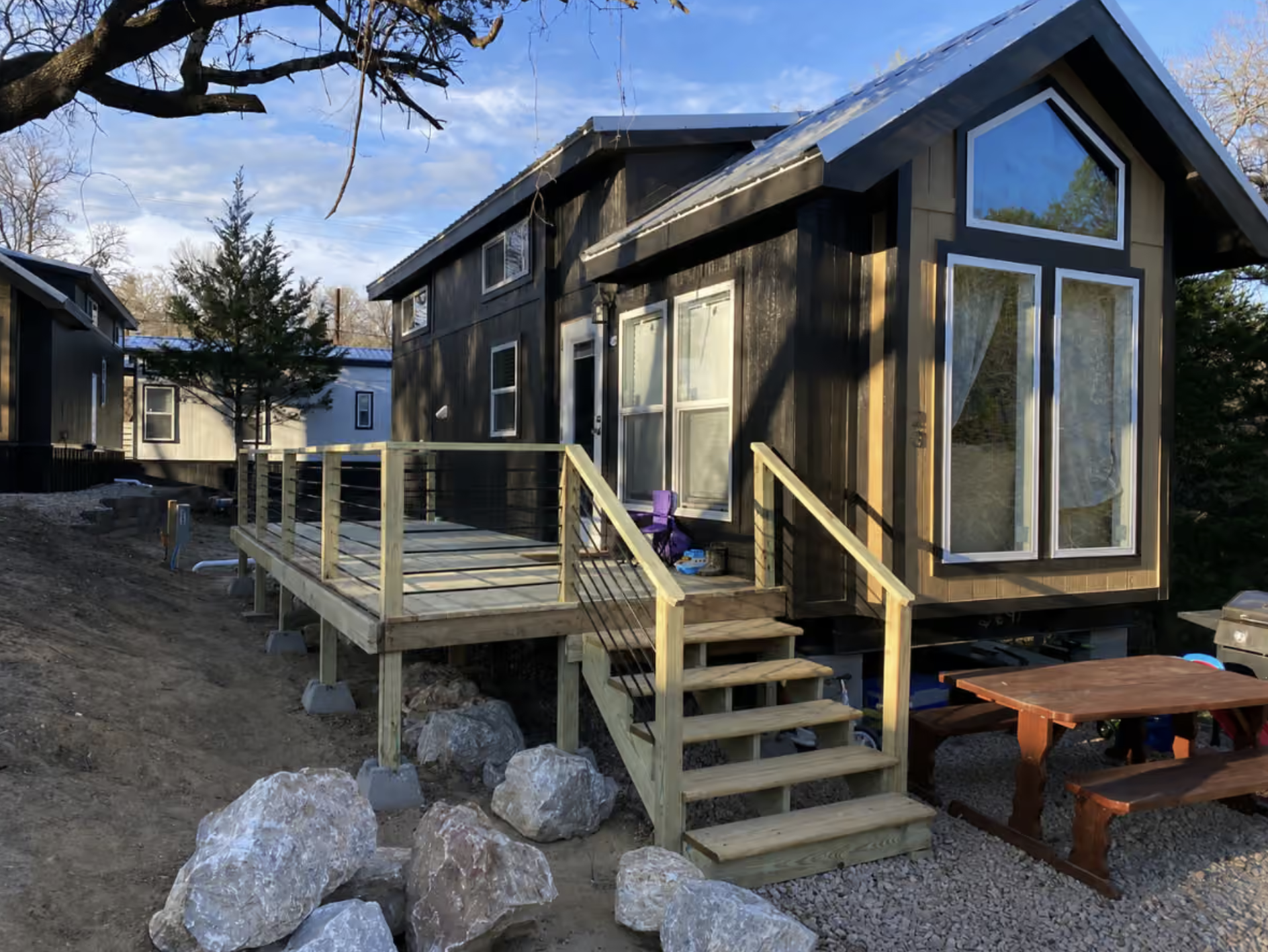 Discover the Athens Park Model Tiny House with a Loft Bedroom